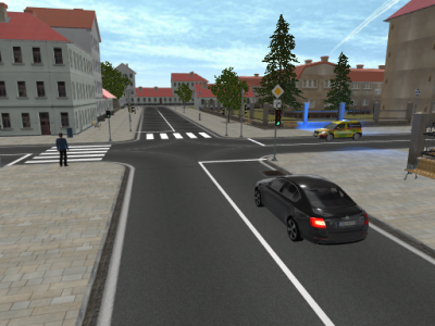 Křižovatka se zelenou, chodcem a sanitkou