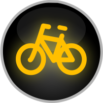 Signál žlutého světla ve tvaru cyklisty