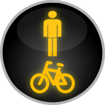 Signál žlutého světla ve tvaru chodce a cyklisty